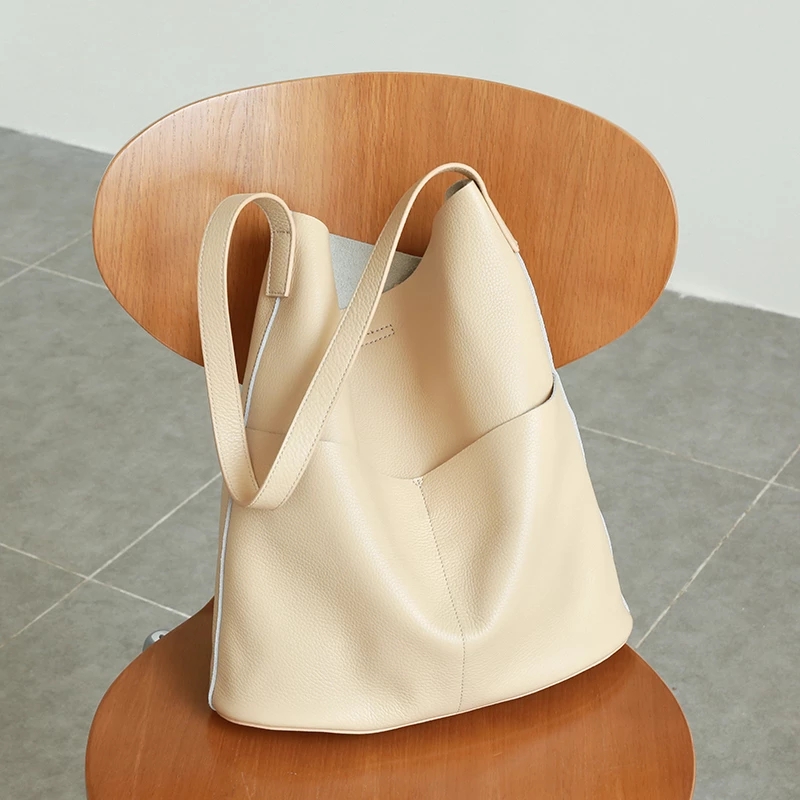 Bolsos de mano de piel de vaca - Laptop Accessories Box reseña y precio